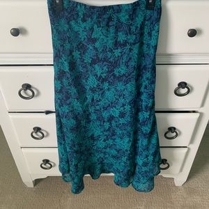 Women’s small long green skirt.